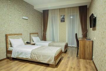 Двухместный номер с 2 отдельными кроватями в Отеле Hotel Gureli